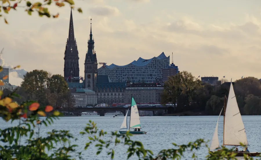 A cloudy sunset in Hamburg, looking across the river to the cathedral.