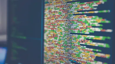 Java coding in different colours on an angled computer screen