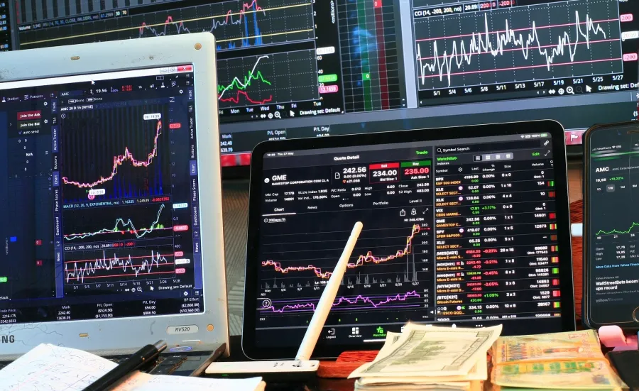 Stock markets index displaying on computer screens