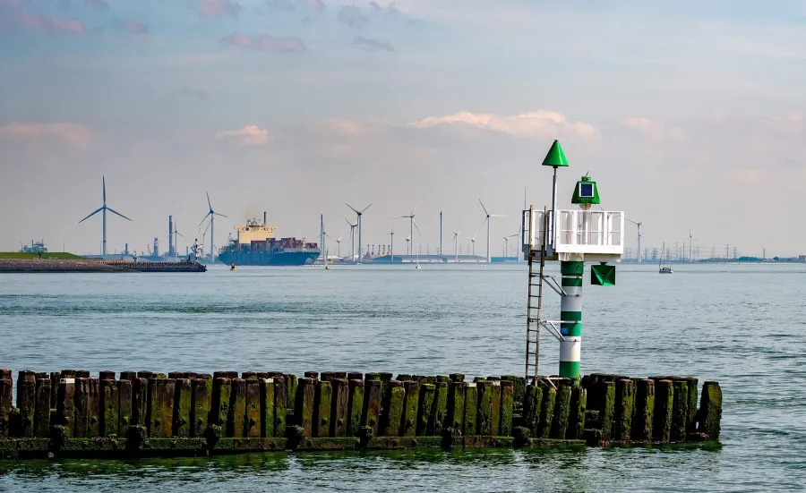 A cargo ship leaving a harbour