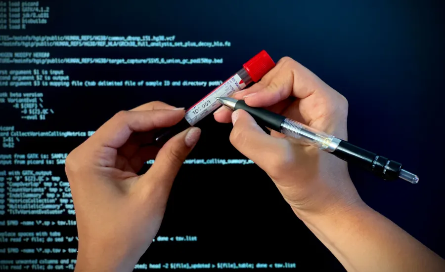 Blood sample being written on with time and date