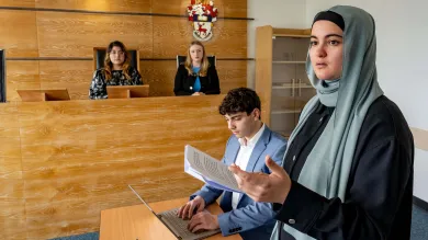 Law students participating in a moot court session.