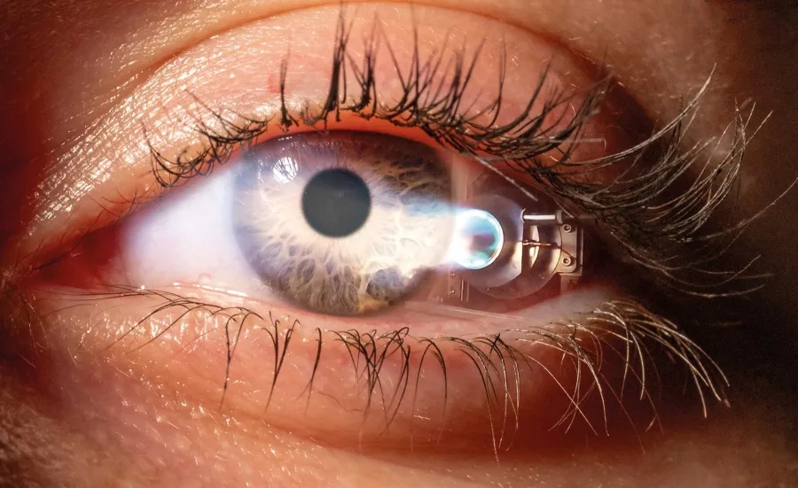 A close-up image of an eye, reflecting a jet propulsion device.