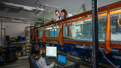 Scientists working with lab equipment