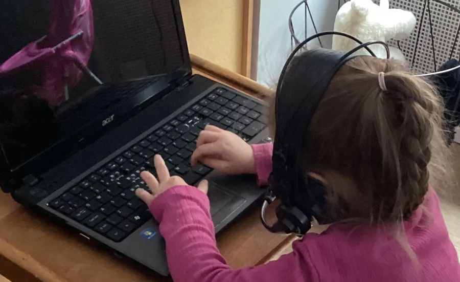 Early Years Centre child using laptop
