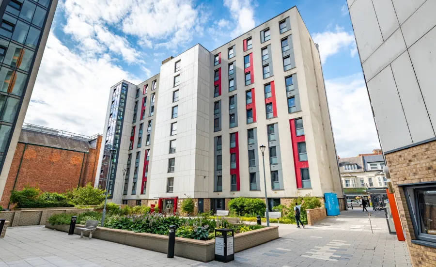 Mayflower C block with the courtyeard garden in the forefront.