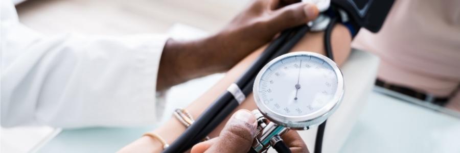 taking a patients blood pressure
