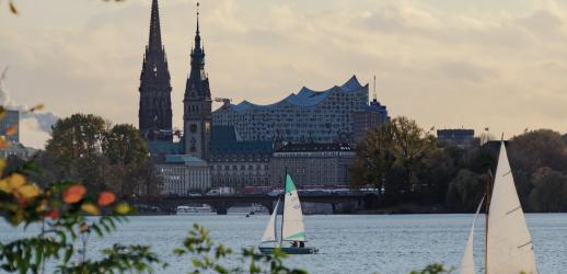 A cloudy sunset in Hamburg, looking across the river to the cathedral.