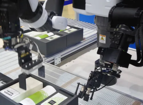 Robotic sensors packing products on a production line