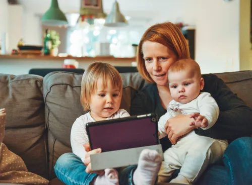 Mum with children using a tablet