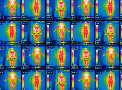 Thermal images of three individuals displaying temperature variations, with temperatures of 35.8°C, 34.2°C, and 33.8°C.