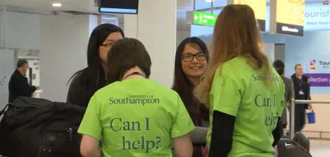 International students being welcomed by Southampton staff at the airport.