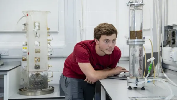 A student at work in the geomechanics laboratory