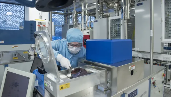 Researcher in a cleanroom