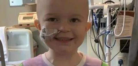 Woody, a young clinical trial patient who is responding well to treatment.