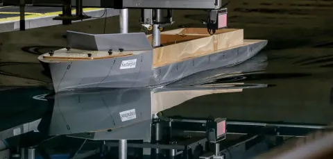 Testing resistance and propulsion in the towing tank.