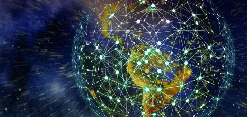 Pixabay illustration of planet earth covered in a blockchain pattern 