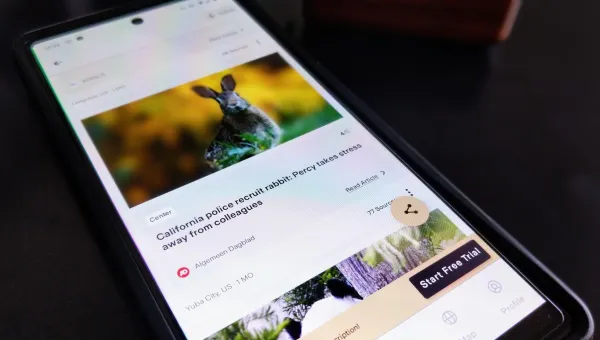 Mobile phone displaying news story about the police recruiting rabbits
