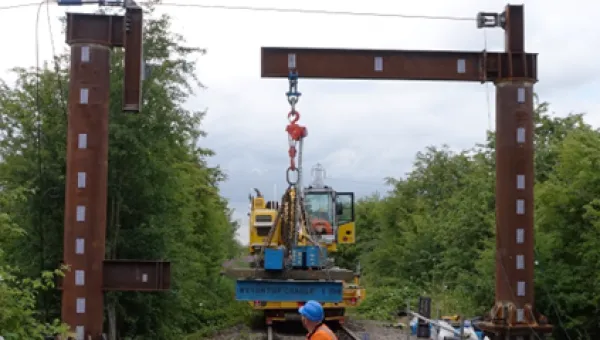 Crane working on train tracks