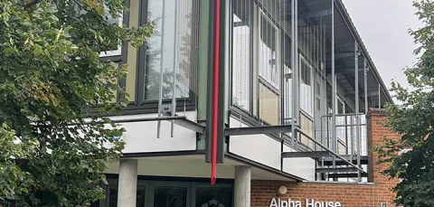 Exterior shot of the front of Alpha House in Chilworth