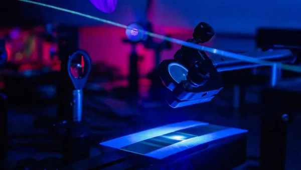 Laser-patterning of a porous paper substrate with a low-power blue laser creating a microfluidic device with a user-defined geometry