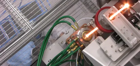 Preform in furnace on tower 