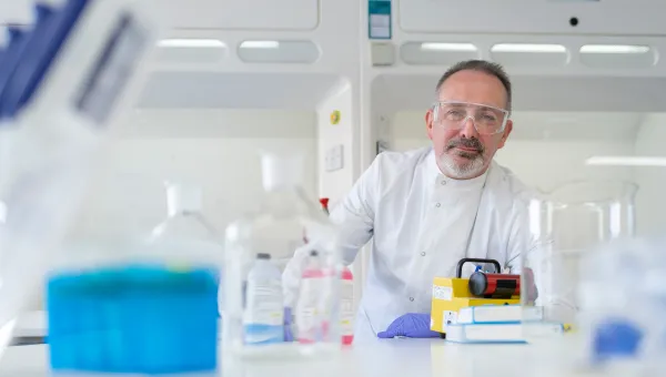 Scientist working with lab equipment