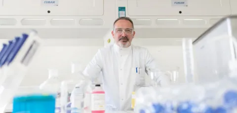 Scientist using laboratory equipment at GAU Radioanalytical Laboratories
