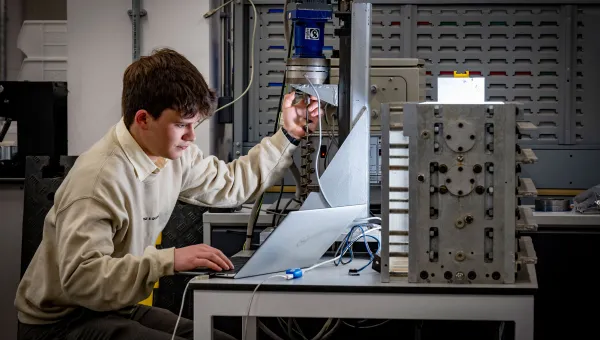 Timofey at work at a desk