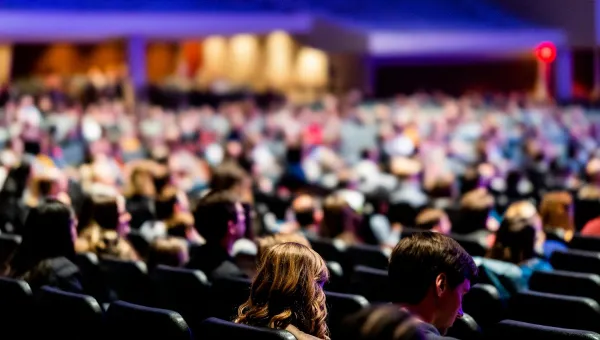 Audience Sitting in Chairs