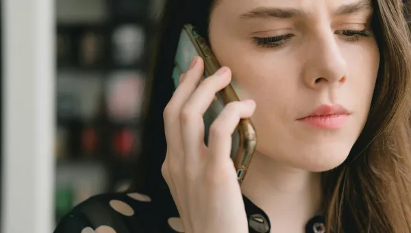Young woman talking on her mobile phone