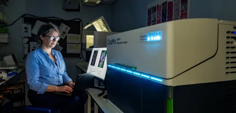 Patricia Goggin uses a high tech imaging device.