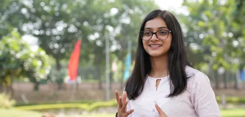 Saumya standing outside