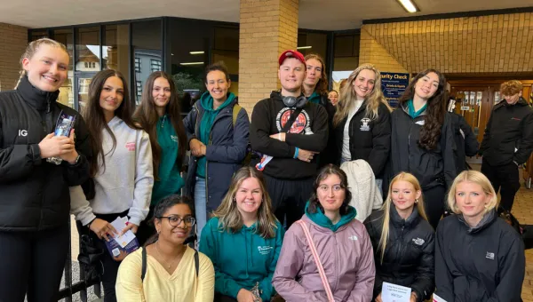 A group of participants taking part in a charity walk