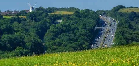 A UK motorway surrounded by countryside. 