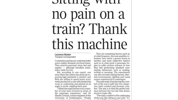 Newspaper article highlighting train passenger comfort research, with the headline “Sitting with no pain on a train? Thank this machine”