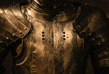 Close up of the chest area of a medieval coat of armour. 