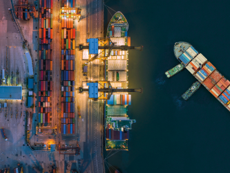 iStock aerial view of a commercial container ship in a dockyard