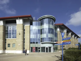 Outside of a glass-clad office building at Southampton General Hospital.