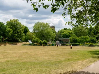 Wide view of St James' Park on a sunny day.
