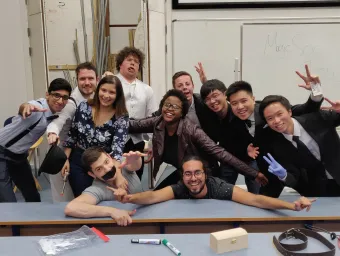 Group of happy students backstage after a show. 