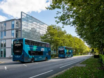 Unilink buses driving down University Road, Highfield Campus. 