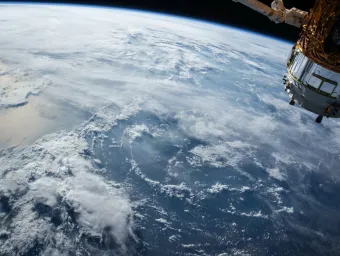 View of Earth from space as a satellite passes out of shot
