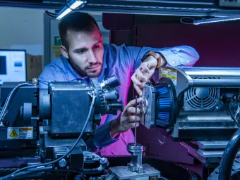 An engineering student using Mu-VIS X-ray imaging equipment