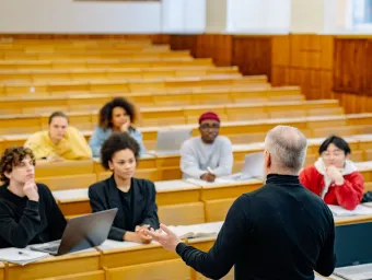 Lecturer and students in a lecture theatre