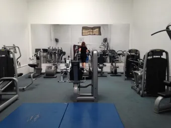 Girl on treadmill in gym