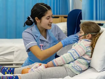 student nurse with patient