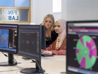 Two students at work in the financial laboratory