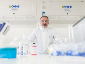 Scientist using laboratory equipment at GAU Radioanalytical Laboratories