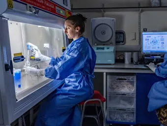 Two people work in a lab